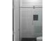 A modern shower stall with a frameless glass door and vertically stacked subway tile at 1610 Niskey Lake Rd, Atlanta, GA 30331