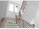 Close up view of the staircase with wood and dark metal railing with many steps at 1610 Niskey Lake Rd, Atlanta, GA 30331