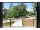 View from the modern balcony showcasing the home's street and surrounding neighborhood at 1610 Niskey Lake Rd, Atlanta, GA 30331