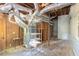 Unfinished basement space with exposed ductwork and wooden framing ready to be finished at 2595 Woodhill Cir, Atlanta, GA 30344
