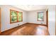 Empty bedroom with light gray walls and hardwood floors at 2595 Woodhill Cir, Atlanta, GA 30344