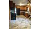 The kitchen features wood paneling and tiled flooring at 2595 Woodhill Cir, Atlanta, GA 30344