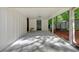 Covered carport with a neutral color scheme, providing sheltered parking and easy access to the entrance at 5689 Woodland Dr, Acworth, GA 30102