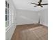 Spacious living area with ceiling fan and wood-look floors at 5689 Woodland Dr, Acworth, GA 30102