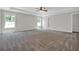 Large main bedroom featuring coffered ceiling, neutral color palette, and ample space at 6645 Crest Wood Ln, Douglasville, GA 30135