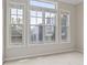 Bright bedroom featuring large windows with blinds and neutral walls at 850 Piedmont Ne Ave # 3304, Atlanta, GA 30308