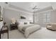 Spacious bedroom with tray ceilings, a ceiling fan and bright windows with shutters at 850 Piedmont Ne Ave # 3304, Atlanta, GA 30308