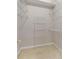 Walk-in closet with carpet and white metal shelving at 850 Piedmont Ne Ave # 3304, Atlanta, GA 30308
