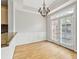 Dining area with view of the kitchen and French doors at 850 Piedmont Ne Ave # 3304, Atlanta, GA 30308