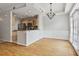 Open-concept dining area with a chandelier and direct access to kitchen at 850 Piedmont Ne Ave # 3304, Atlanta, GA 30308