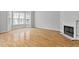 Living room with hardwood floors, a fireplace, and a bay window at 850 Piedmont Ne Ave # 3304, Atlanta, GA 30308