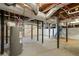 Spacious unfinished basement with exposed ceiling and a water heater at 3180 Rehoboth Dr, Decatur, GA 30033