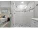 Bright glass shower adjacent to the main bedroom featuring mosaic tile and marble walls at 3180 Rehoboth Dr, Decatur, GA 30033