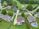 Aerial view of the neighborhood, highlighting well-maintained homes and landscaped yards near the golf course at 388 Golf Crest Dr, Acworth, GA 30101