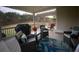Inviting back porch featuring comfortable seating and a view of the lush backyard at 388 Golf Crest Dr, Acworth, GA 30101