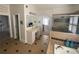 Luxurious primary bathroom with a bathtub, glass shower, and double sink vanity at 388 Golf Crest Dr, Acworth, GA 30101