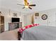 Comfortable bedroom with closet, tv, and sports themed decor at 388 Golf Crest Dr, Acworth, GA 30101