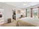 Bedroom with a walk-in closet, neutral walls, carpet flooring, and natural light at 388 Golf Crest Dr, Acworth, GA 30101