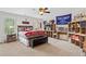 Bedroom featuring a decorative desk, shelves, and carpet flooring at 388 Golf Crest Dr, Acworth, GA 30101