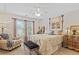 Comfortable bedroom with carpet, natural light, and classic furnishings at 388 Golf Crest Dr, Acworth, GA 30101