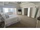 Spacious bedroom with tray ceiling, neutral carpet, and lots of natural light at 388 Golf Crest Dr, Acworth, GA 30101