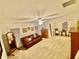 Spacious bonus room featuring neutral carpet and a comfortable brown leather couch at 388 Golf Crest Dr, Acworth, GA 30101