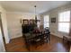 Dining room with hardwood floors, natural lighting, and wainscoting at 388 Golf Crest Dr, Acworth, GA 30101