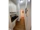 Office nook with built-in cabinets, granite countertop, and hardwood floors at 388 Golf Crest Dr, Acworth, GA 30101
