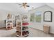 Walk-in closet with custom shelving units, shoe storage, and natural light at 388 Golf Crest Dr, Acworth, GA 30101