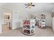 Spacious walk-in closet with custom shelving and a door leading to the en-suite bath at 388 Golf Crest Dr, Acworth, GA 30101
