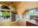 Finished attic space with a view into a secondary room with exercise equipment at 891 Paoli Se Ave, Atlanta, GA 30316