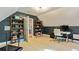 Finished attic area with desk, shelving, and treadmill for exercise at 891 Paoli Se Ave, Atlanta, GA 30316