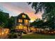 Charming backyard with a cozy fire pit area and outdoor dining space, perfect for relaxing evenings at 891 Paoli Se Ave, Atlanta, GA 30316