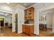 Charming dining area with built-in cabinets and hardwood floors next to the living room at 891 Paoli Se Ave, Atlanta, GA 30316