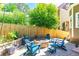 A cozy backyard featuring a fire pit area with Adirondack chairs, perfect for outdoor relaxation and gatherings at 891 Paoli Se Ave, Atlanta, GA 30316