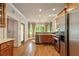 Well-lit kitchen featuring stainless steel appliances and hardwood floors at 891 Paoli Se Ave, Atlanta, GA 30316