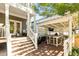 Spacious outdoor kitchen and entertaining area with a built-in grill and bar seating at 891 Paoli Se Ave, Atlanta, GA 30316
