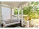 Cozy covered porch with comfortable seating, ideal for enjoying the view and fresh air at 891 Paoli Se Ave, Atlanta, GA 30316