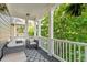 Outdoor porch with comfortable seating overlooking the landscape at 891 Paoli Se Ave, Atlanta, GA 30316