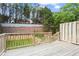 A spacious wooden deck overlooks a well-maintained backyard, perfect for outdoor entertaining at 4044 Spring Cove Dr, Duluth, GA 30097