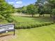 Community park with playground, benches, green space, and the Rogers Bridge Park sign at 4044 Spring Cove Dr, Duluth, GA 30097