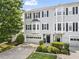 Charming townhouse with well-maintained landscaping and a two-car garage at 4044 Spring Cove Dr, Duluth, GA 30097