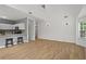Open-concept living room with a kitchen, with a high ceiling at 4044 Spring Cove Dr, Duluth, GA 30097