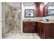 Bathroom with a glass shower and granite countertop vanity at 740 Creek Wind Ct, Duluth, GA 30097