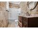Elegant bathroom with decorative tiling, granite countertop, and a shower over tub at 740 Creek Wind Ct, Duluth, GA 30097