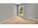 Bedroom with natural light and a neutral color scheme at 15 Porter Cir, Hampton, GA 30228