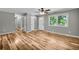 Inviting living room features wood-look flooring and fresh gray paint at 15 Porter Cir, Hampton, GA 30228