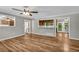 Spacious living room featuring wood-look flooring and fresh paint at 15 Porter Cir, Hampton, GA 30228