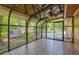 Screened in sunroom provides views to the lush backyard and patio at 15 Porter Cir, Hampton, GA 30228