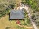 An aerial view showcases the home's roof, landscaping, driveway, and surrounding greenery at 2270 Emerald Dr, Jonesboro, GA 30236
